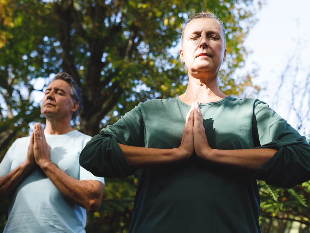 peaceful-senior-caucasian-couple-practicing-yoga-2022-01-18-23-47-07-utc-1-1