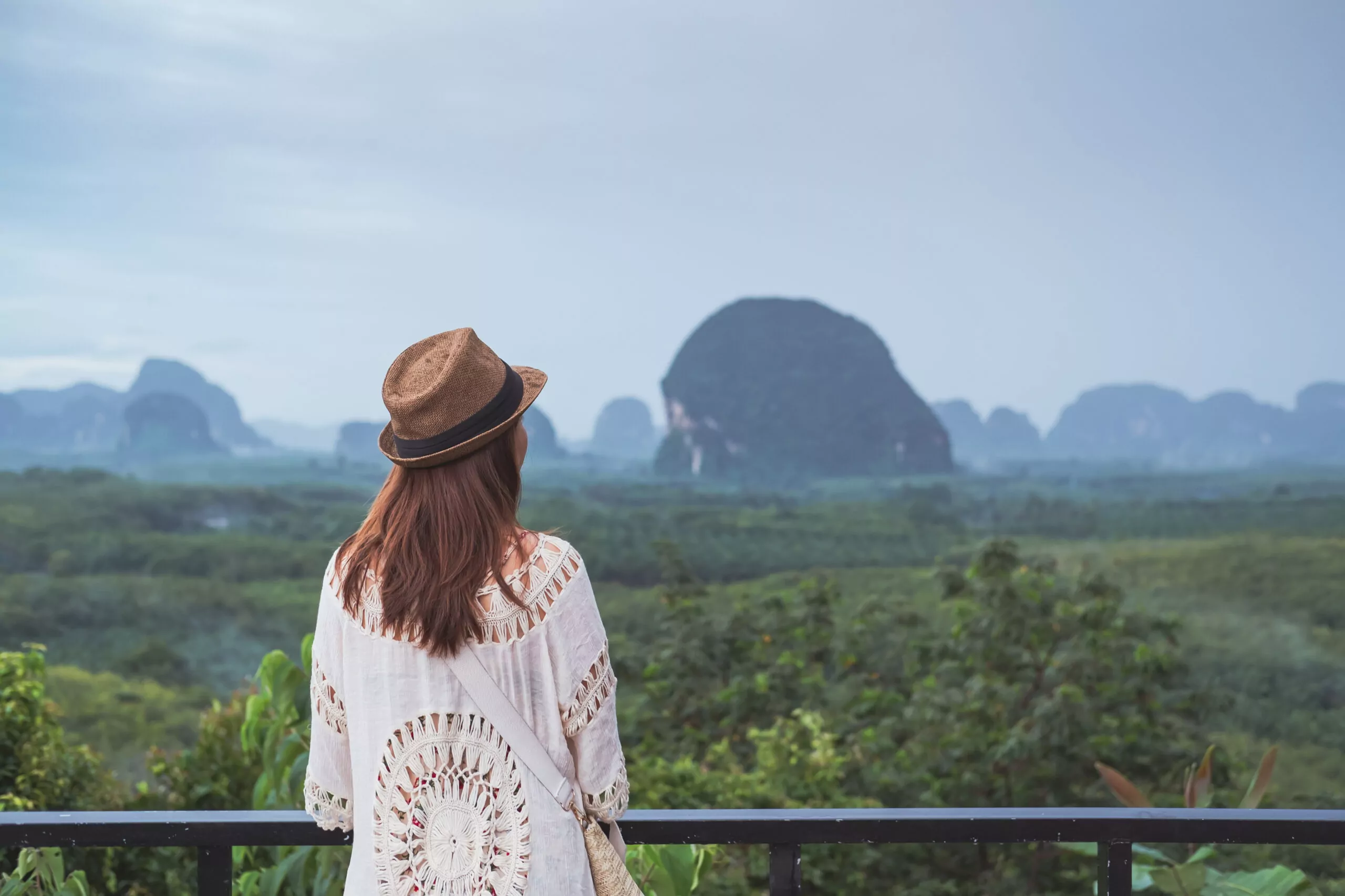 young-woman-traveler-looking-at-beautiful-view